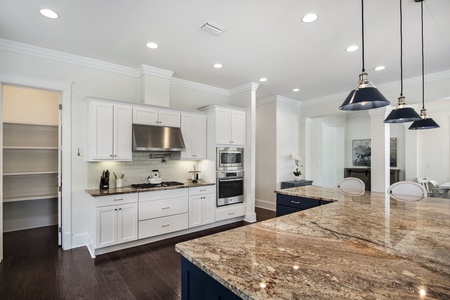 The kitchen features stainless appliances and high-end finishes!