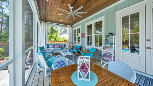 The screened porch leads out to the pool and yard!