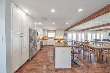 The fully stocked kitchen has a great flow for large families!