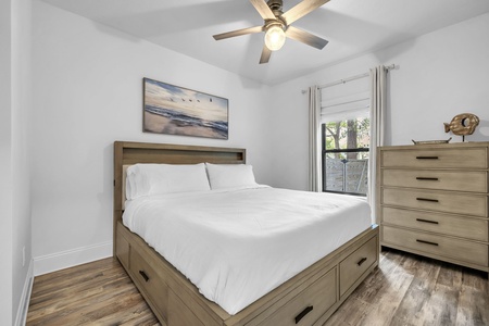 The guest bedroom features a king bed, with full bathroom right next door!