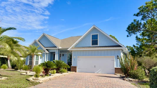 "Tropical Haven" - surrounded by lush landscaping and state forest.