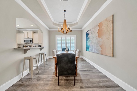 The dining/kitchen area also includes a breakfast bar!