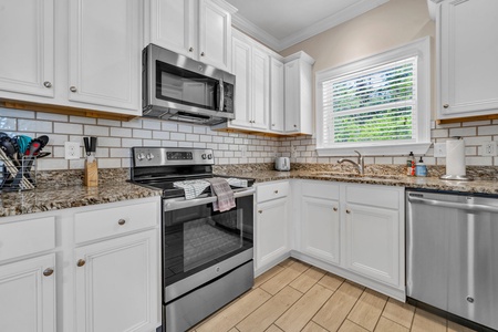 The kitchen is spacious and well equipped!