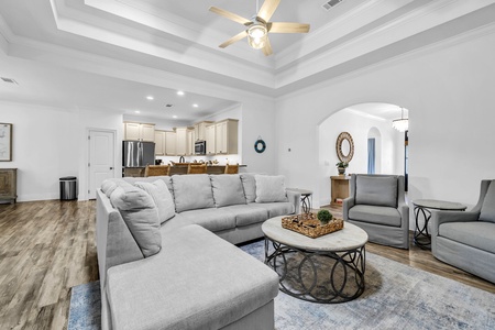 The plush living room and open-floor plan make for perfect family gatherings!