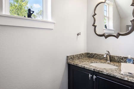 A convenient half-bath is located just off the kitchen!