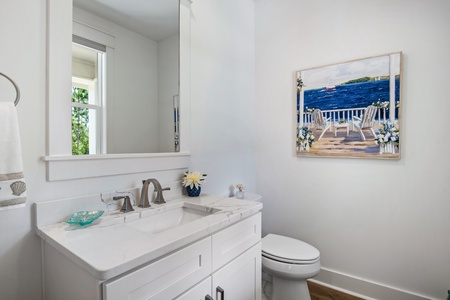 A convenient half-bath is located just off the entry foyer!