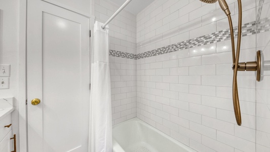The hall bathroom is full-size bathroom with a tub/shower combo!