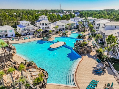 The amazing and spacious neighborhood pool features multiple grottos and waterfalls!