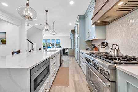 The kitchen is well stocked and features high-end finishes!