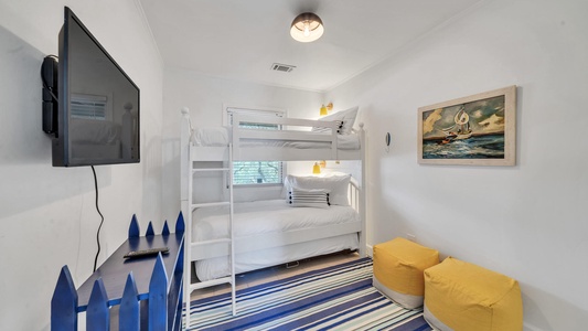 The bunk room includes 2 twin bunks and a twin trundle!