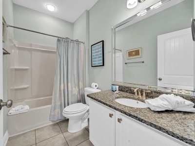 The guest bathroom with shower-tub combo!