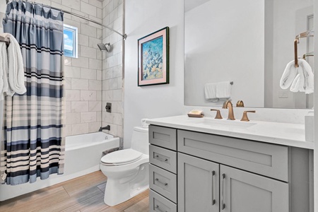 The 2nd floor guest bathroom features a tub/shower combo!