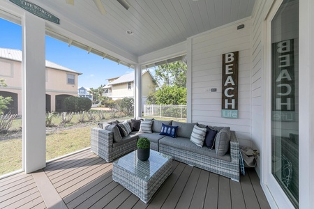 Lounge in the breeze on the shaded/screened back porch!