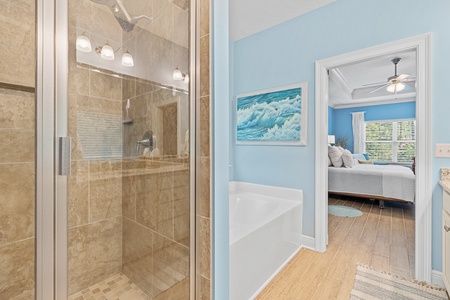 The master bath features dual sinks, a bathtub and walk-in shower!