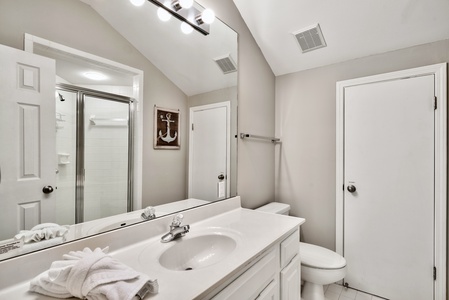 The loft bathroom includes a walk-in shower!