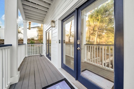 Your private balcony offers peaceful morning coffee moments with tropical palm views and coastal breezes.