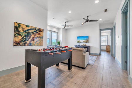 3rd floor family room - large TV, foosball, mini-fridge!