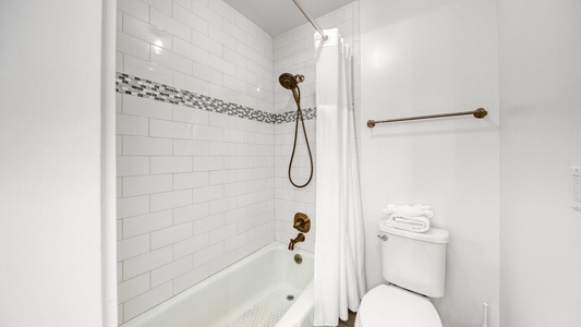 The master suite includes a king size bed and full bathroom!
