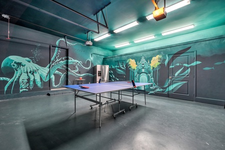 Poseidon's Game Room with ping-pong, gaming wall, full-size fridge!