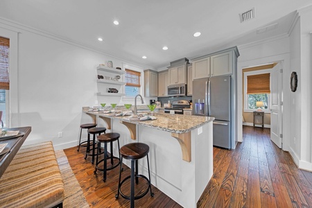 The kitchen features modern finishes and plenty of counterspace!
