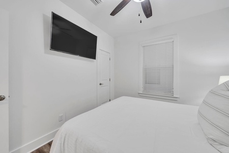 The guest bedroom offers a queen size bed, with full bathroom across the hall!