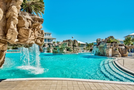 The massive pool features multiple levels, grottos, fountains, and waterfalls!