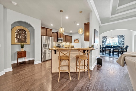 A fully stocked, spacious kitchen with breakfast bar!