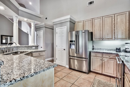Recent upgrades included new stone countertops and stainless steel appliances!