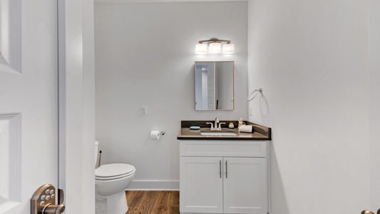 A half-bathroom is conveniently located just off the main living space!