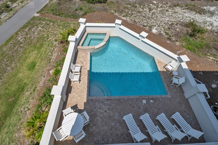 Oversized pool and sun deck!  Loungers and dining table!