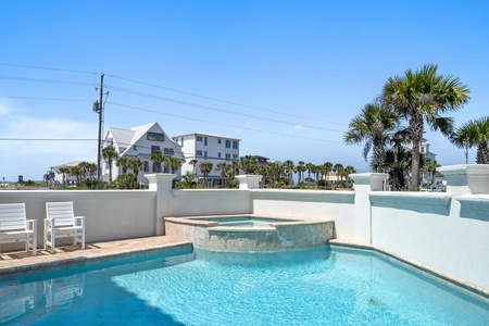 Pool includes a raised hot tub!