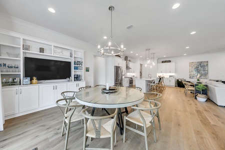 Plenty of seating at dining table and breakfast bar!