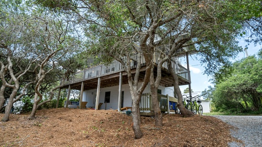 Nestled on a dune hill amongst live oaks, you'll be amazed with the shade and breezes!