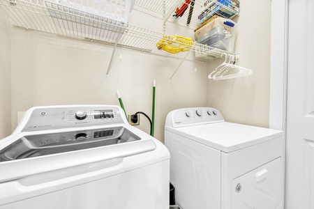 Your private laundry room makes staying fresh effortless with full-size washer and dryer plus organized storage.