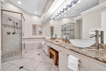 The expansive master bath with dual vanities, walk-in shower, and soaking tub!