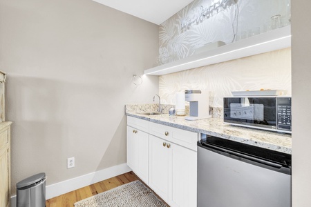The master suite wet bar with mini fridge.