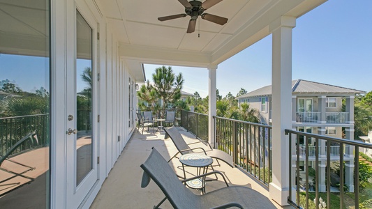 The spacious 3rd floor balcony with amazing neighborhood/pool views!