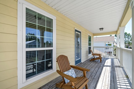Relax in the shade with neighborhood views on the master balcony!