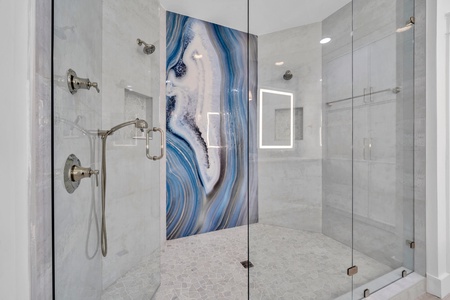 Beautiful artwork in the ground floor king suite walk-in shower!