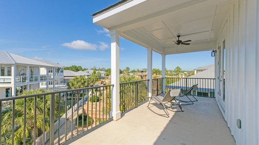 The spacious 3rd floor balcony with amazing neighborhood/pool views!