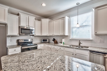 The spacious kitchen is perfect for preparing family meals!