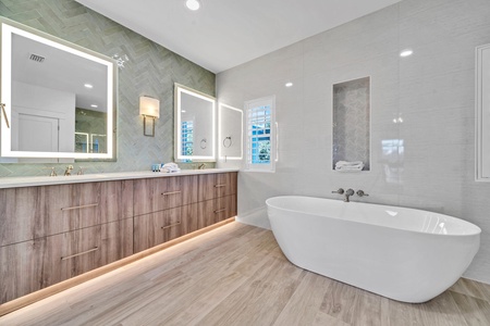 The 2nd floor master bath features dual vanities, walk-in shower and soaking tub!