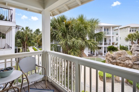 The master bedroom's private balcony looks down to the pool area!