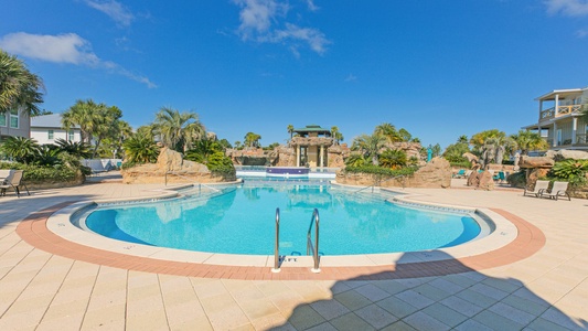 The massive pool features multiple levels, grottos, fountains, and waterfalls!