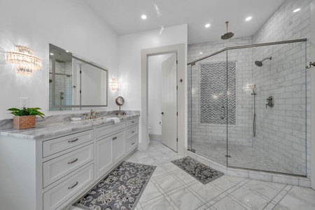 The master bathroom includes a large walk-in shower!