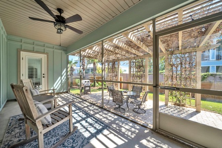 Lounge on the screened porch and take in the beach breezes!
