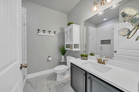 The full-sized bathroom with walk-in shower!