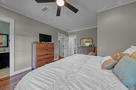 The master bedroom, with king bed, private bath, walk-in shower, and balcony!