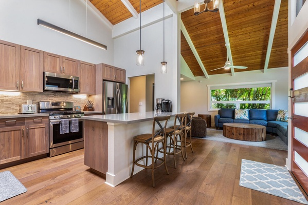 The kitchen island/bar for quick meals or entertainment.