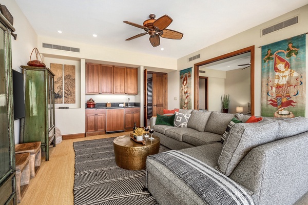 Bonus retreat room with flat screen TV, wet bar and deck.